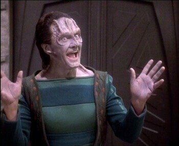 Elim Garak, waving his hands dramatically