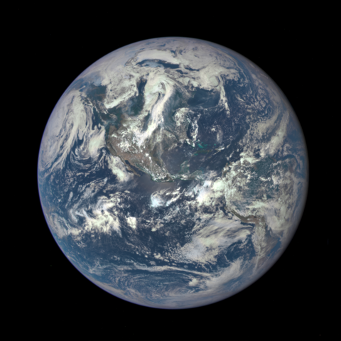 A photo of planet Earth from one million miles away (NASA)

For the visually impaired. From space, planet earth looks like a spherical ball. Though technically the shape is an oblate ellipsoid. The predominant colors are the blues of the oceans, the whites and greys of the clouds, and the greens, browns, greys, and whites among others, of the land masses. 

Because light and sound are part of the electromagnetic spectrum - someone could imagine that the difference between, for example, white and blue, is similar to the difference between a harmonic set of pitches (musical chords)

It far as we know - Planet Earth may be one of a kind. And yet, the probabilities suggest that somewhere out there in the vastness of space - could be another Earth-like planet that harbors life. 

If humans learn to mitigate their intraspecies conflicts, maybe, just maybe, the day will come when we make first contact with whomever "they" are. 

Or perhaps humans are alone, or rather that is simply not true - as we have recorded more than 2.13 million species on the planet Earth. https://ourworldindata.org/how-many-species-are-there

But, (some) human activities are driving many species to extinction. https://www.iucnredlist.org/resources/summary-statistics

There is good news. Some thoughtful people have saved many species from the brink of extinction https://www.wechoosenature.org/inspire/10-animals-saved-extinction

Photo. https://www.nasa.gov/image-feature/nasa-captures-epic-earth-image




