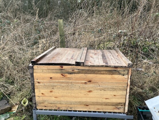 Wooden box with a lid on it