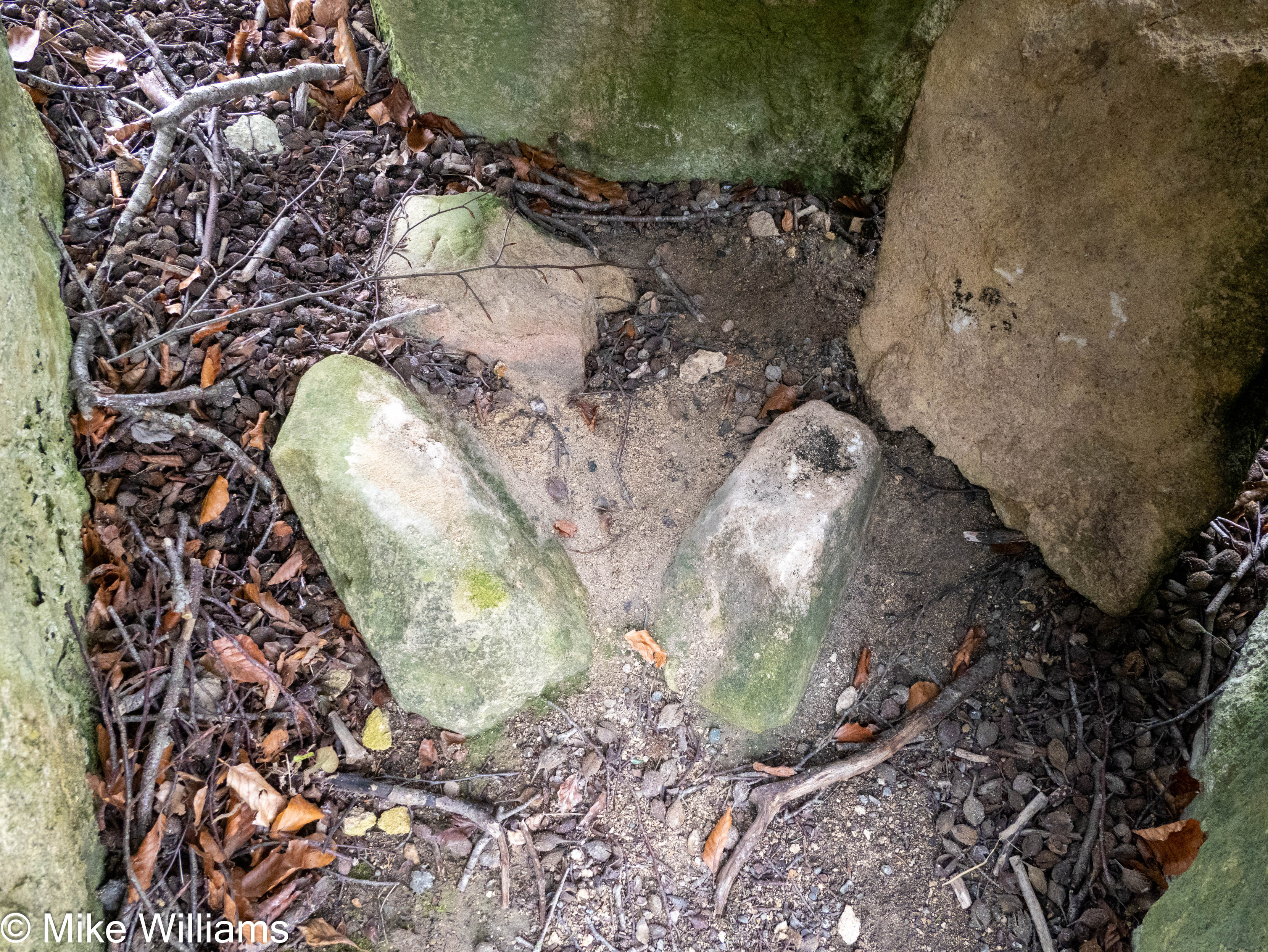 Three small stones arranged in almost a triangle