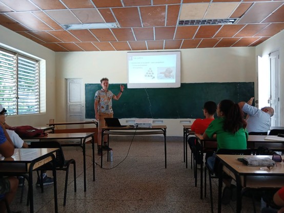 Me presenting to what looks like an empty room
