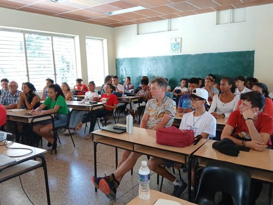Class full of students, including me, watch talk by ZSL staff Dave Clarke